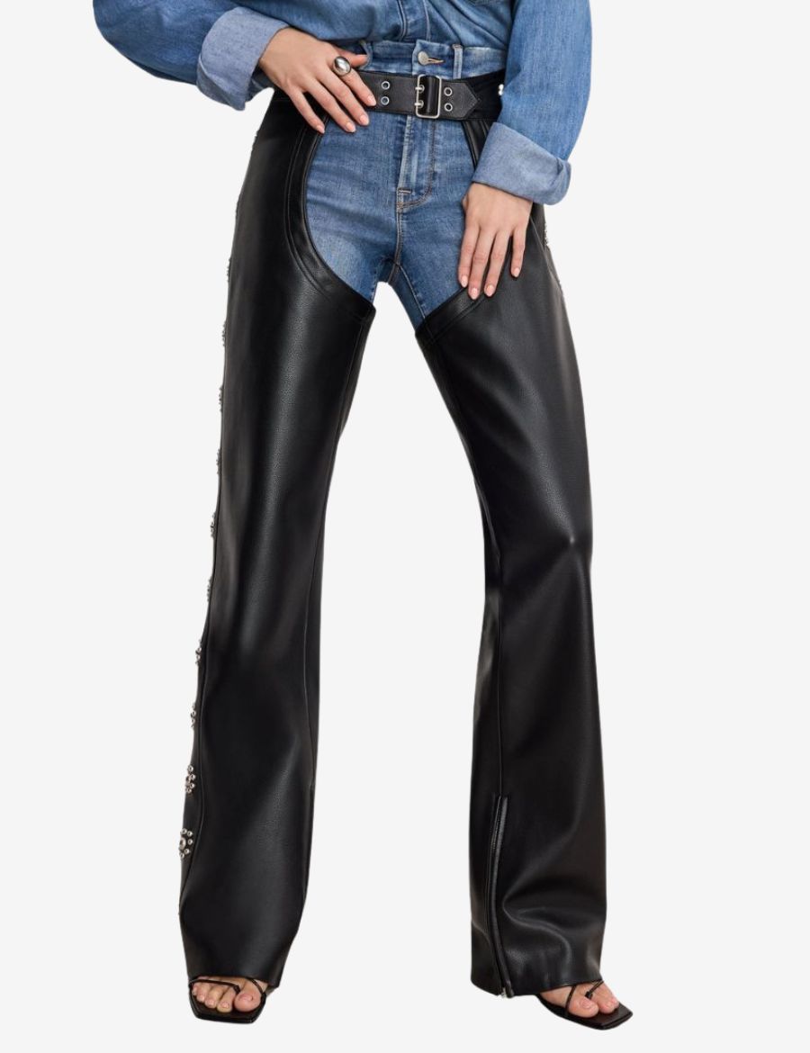 Front view of womens floral concho assless chaps in a stylish western design featuring black leather, decorative floral conchos, a wide buckle belt, and a flattering open-front silhouette.